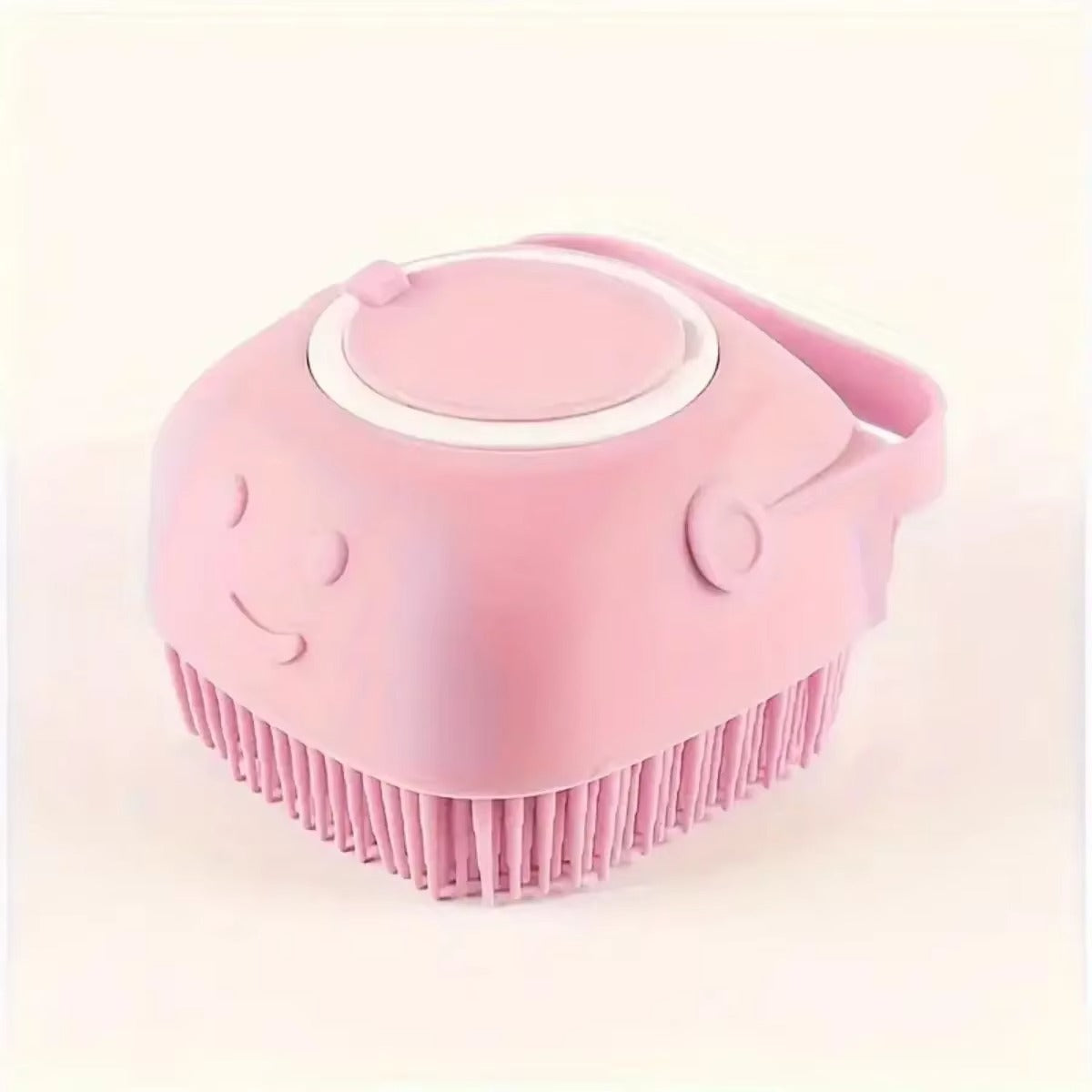 Pink silicone scrubber with smiley face design on a light pink background