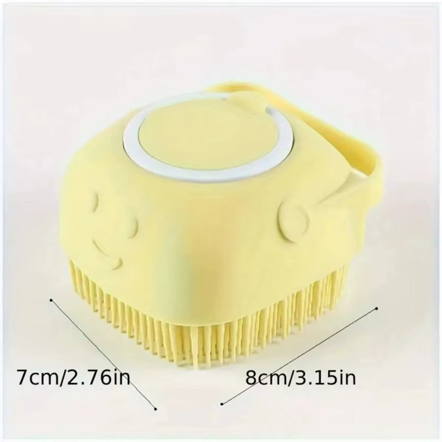 Yellow silicone scrubber with dimensions on a light pink background