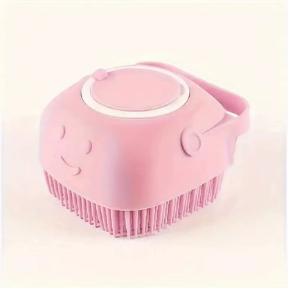 Pink silicone scrubber with smiley face design on a light pink background